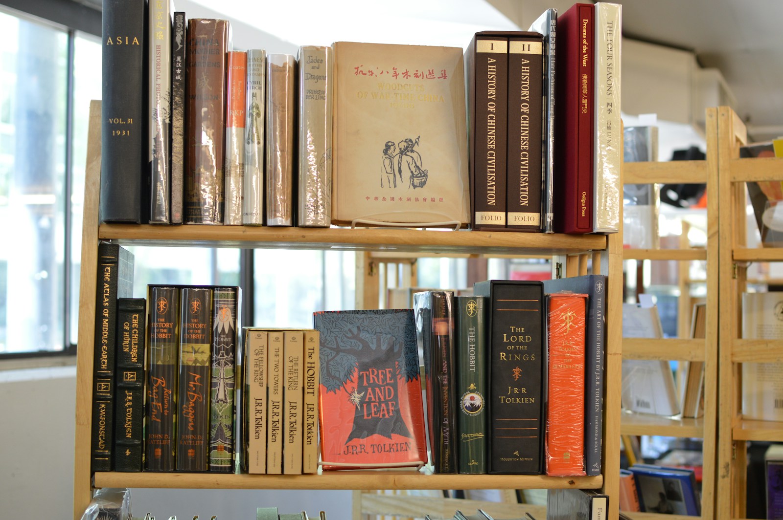 A Wooden Bookshelf Filled With Various Old Books Jigsaw Puzzle Free Online Jigsaw Puzzle