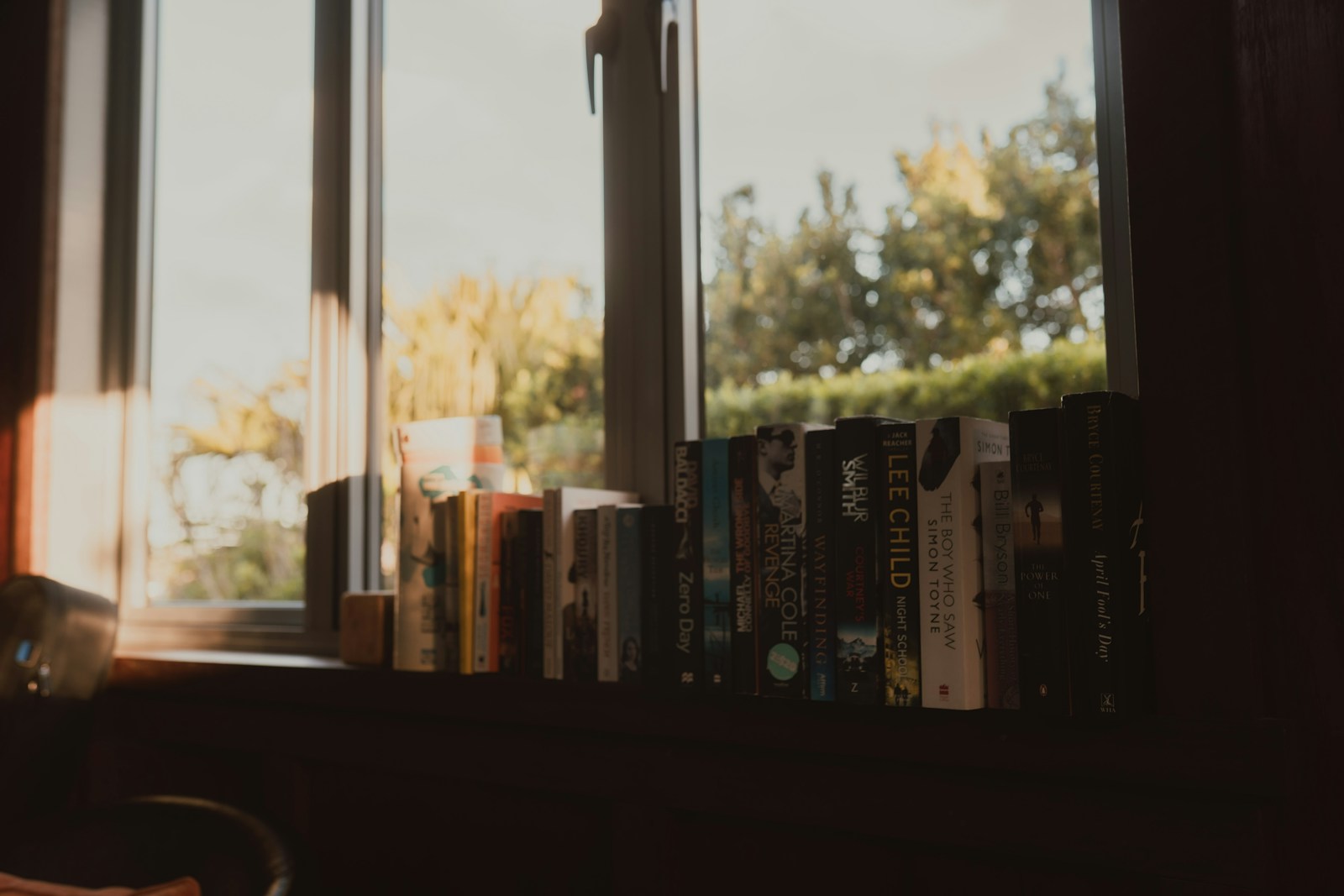Books On A Windowsill Bathed In Warm Sunlight Jigsaw Puzzle Free Online Jigsaw Puzzle