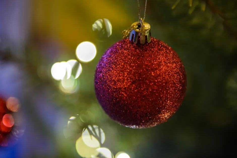 Festive Red Glitter Christmas Ornament Hanging On Jigsaw Puzzle Free Online Jigsaw Puzzle