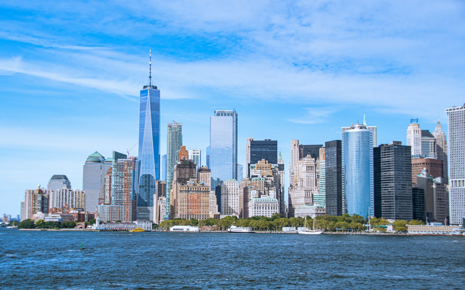 City Skyline Across Body Of Water During Daytime Jigsaw Puzzle Free Online Jigsaw Puzzle