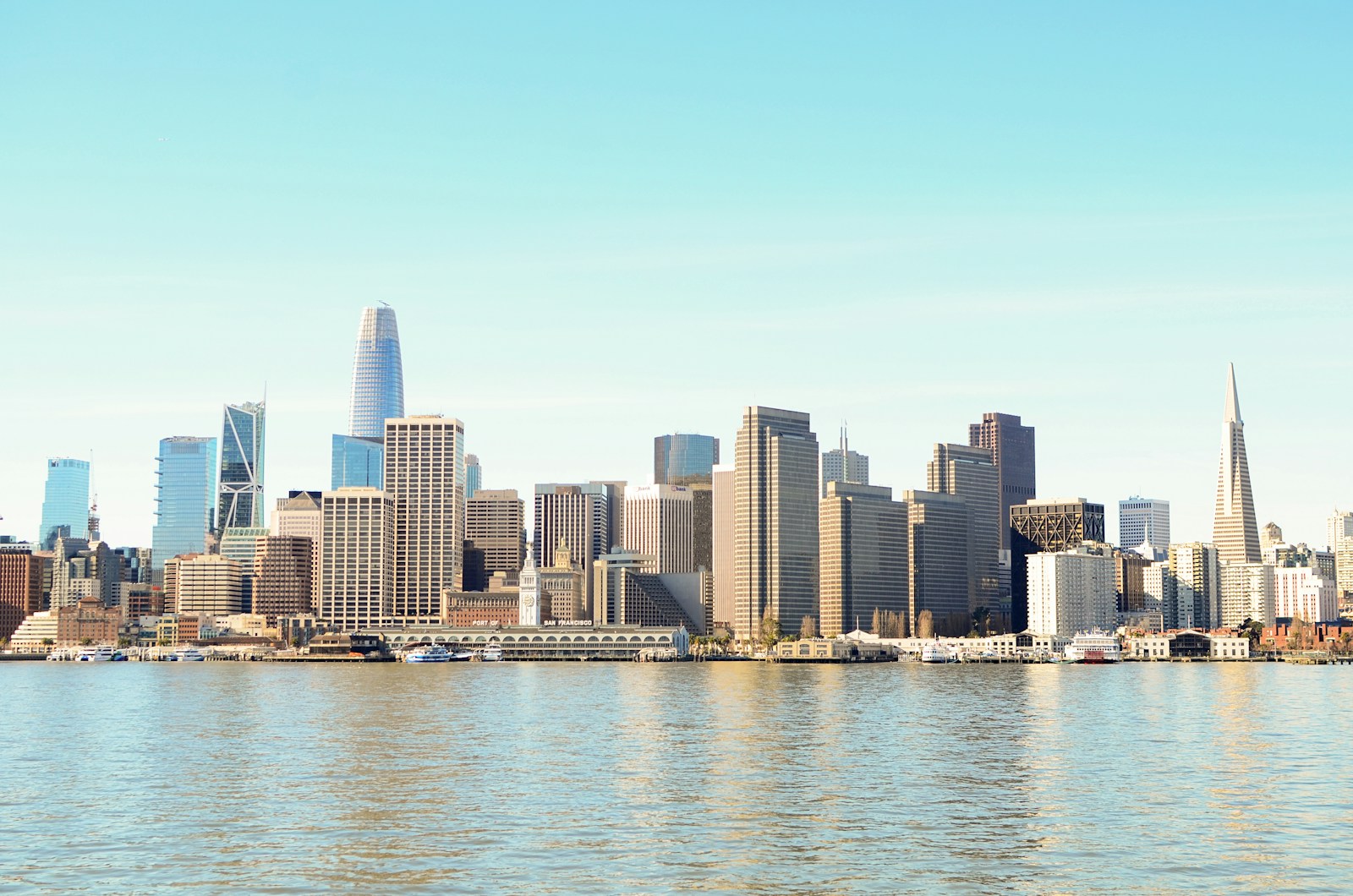 City Skyline Across Body Of Water During Daytime Jigsaw Puzzle Free Online Jigsaw Puzzle