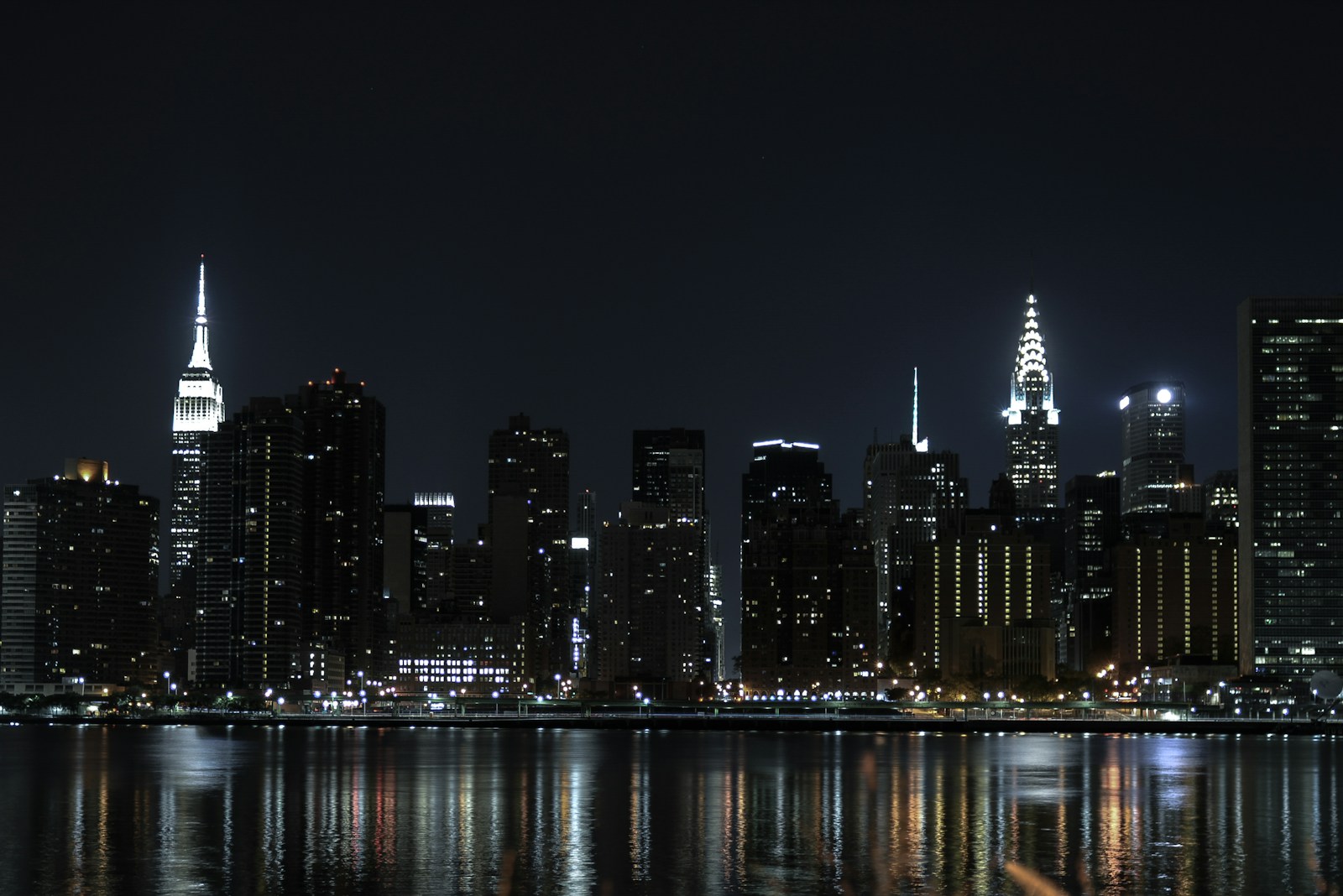 City Skyline Across Body Of Water During Night Tim Jigsaw Puzzle Free Online Jigsaw Puzzle
