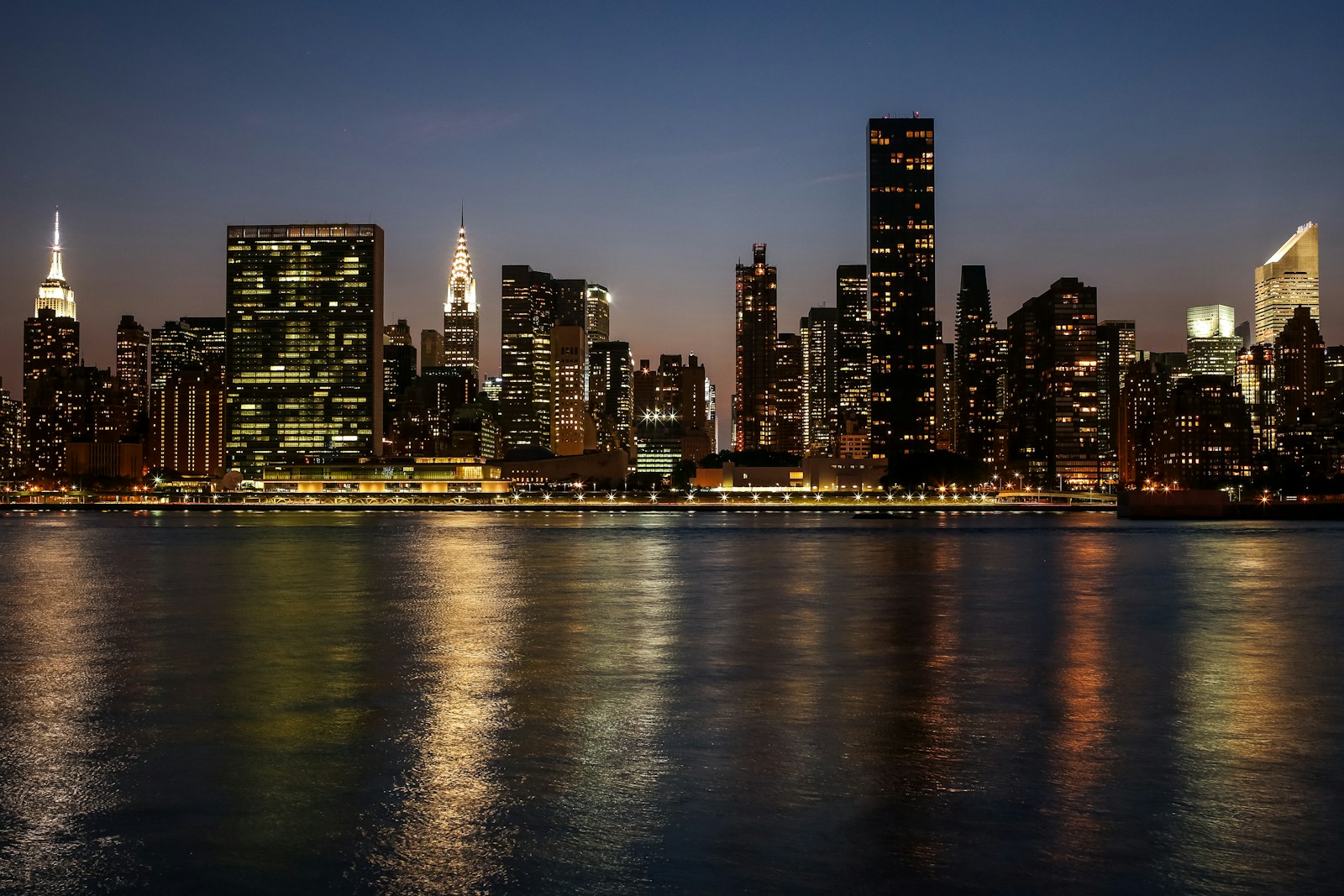 City Skyline Across Body Of Water During Night Tim Jigsaw Puzzle Free Online Jigsaw Puzzle