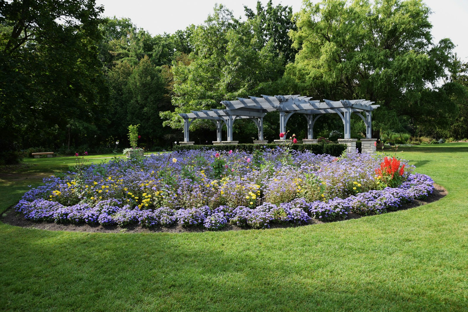 A Flower Garden With A Gazebo In The Middle Of It Jigsaw Puzzle Free Online Jigsaw Puzzle